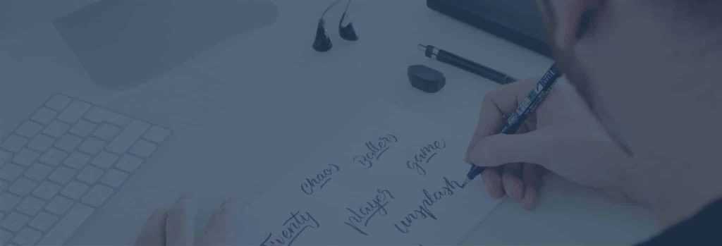 Graphic designer at JKC Media working on a brand identity design