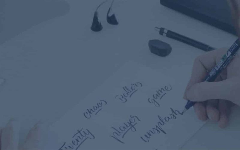 Graphic designer at JKC Media working on a brand identity design