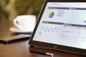 Digital marketing concept with charts and online marketing icons