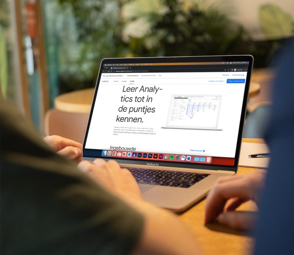 Google Analytics 4 dashboard on a laptop screen