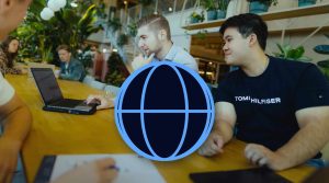 JKC colleagues in a meeting, with a large globe icon: matching tone of voice per market to your audience