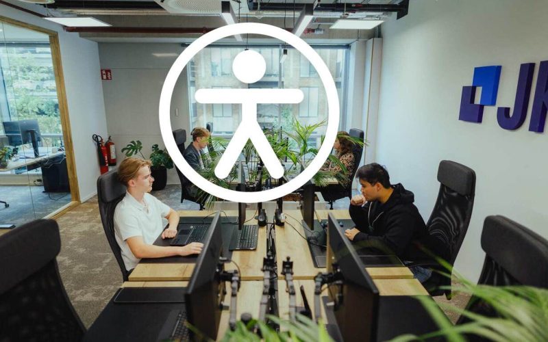 Digital accessibility: the JKC team at work in the office with an accessibility icon