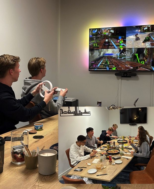 Collega's die Mario Kart spelen en avondeten op kantoor van JKC